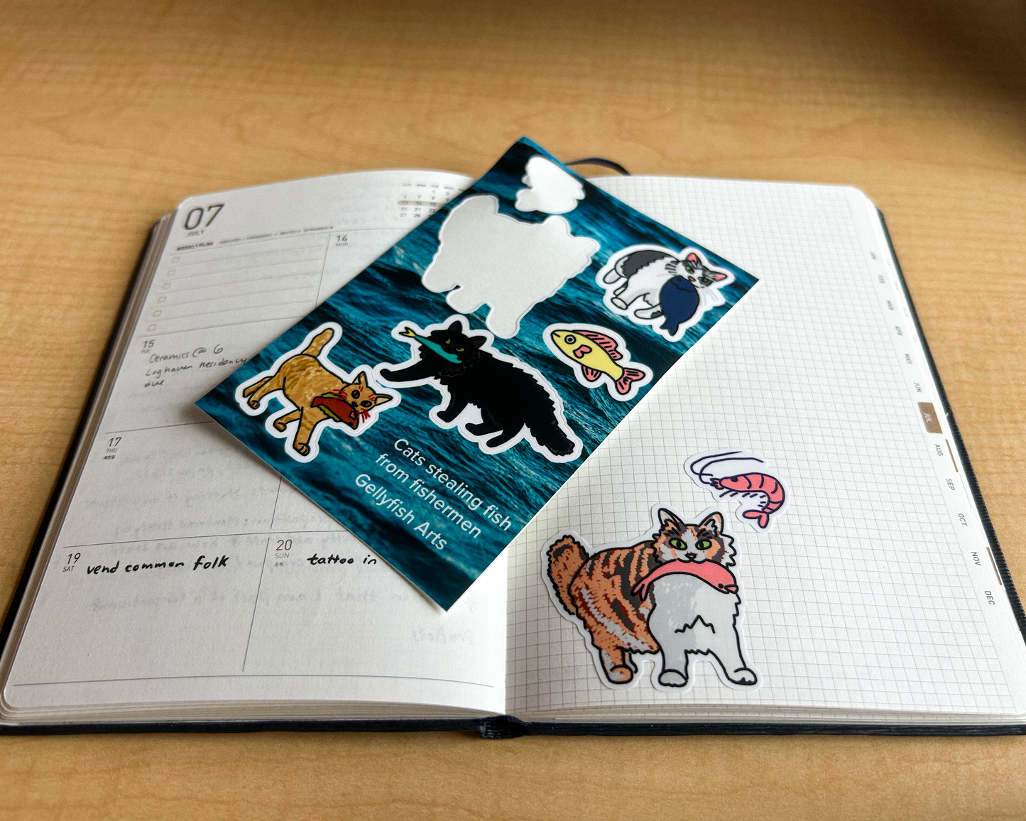 cats stealing fish sticker sheet